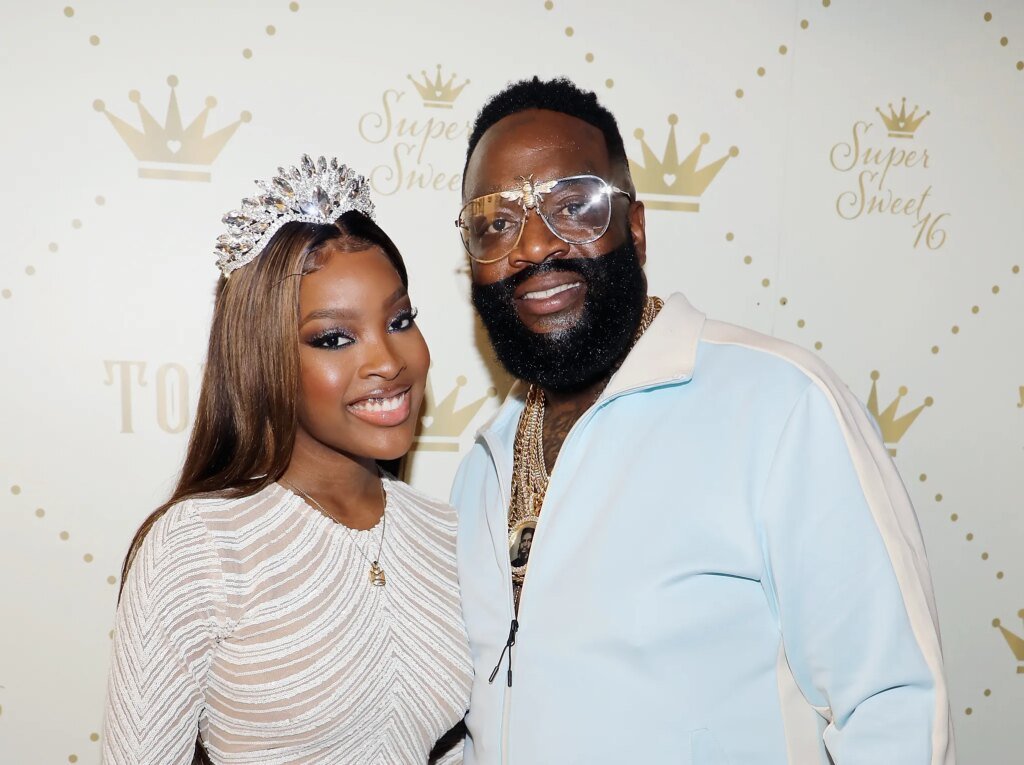 Rick Ross’ Daughter Toie Roberts Tells Him To Act His Age (49) Rick Ross' Daughter Toie Roberts Tells Him To Act His Age (49)