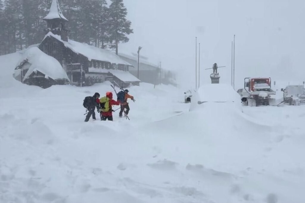 Rescuers push through winter storm to 6 survivors of a California avalanche; 9 others are missing