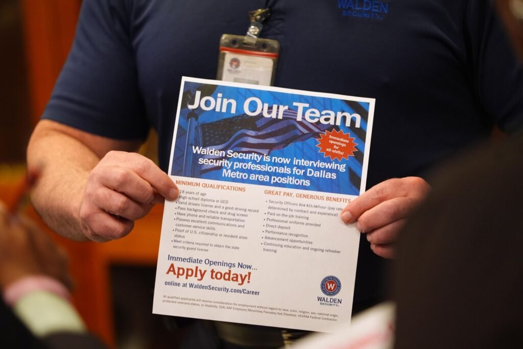 U.S. applications for jobless aid fall to 206,000 last week as layoffs remain low