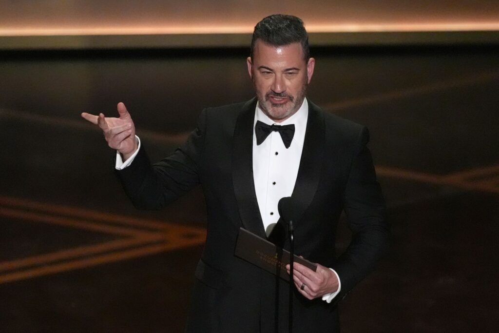 At Oscars, Kimmel zings Melania Trump, compares Colbert to victim of totalitarian regime