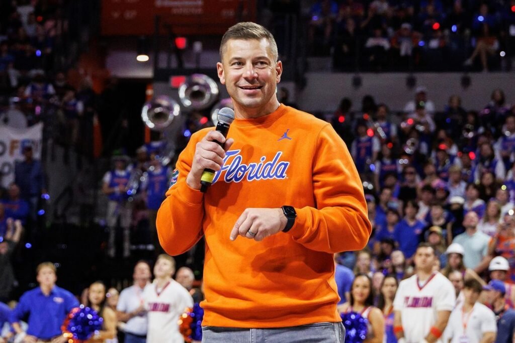 Florida coach Jon Sumrall's photoshoot with a 7-foot alligator includes some tense moments