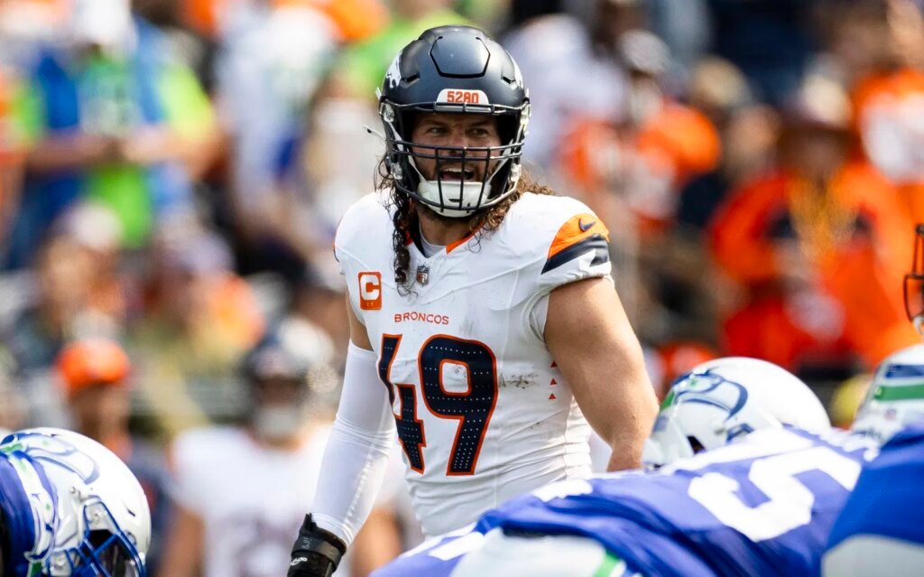 Former CFL player Alex Singleton receiving NFL's Ed Block Courage Award with Denver Broncos