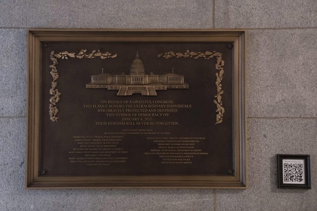Jan. 6 plaque honoring police officers is installed at the Capitol after a 3-year delay