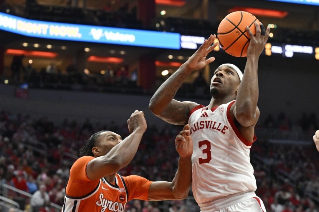 Louisville waltzes past Syracuse with strong deep shooting Louisville waltzes past Syracuse with strong deep shooting