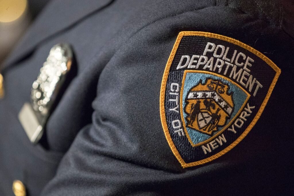 NYPD says officer who guards mayor's home is suspended after shooting a man while off duty
