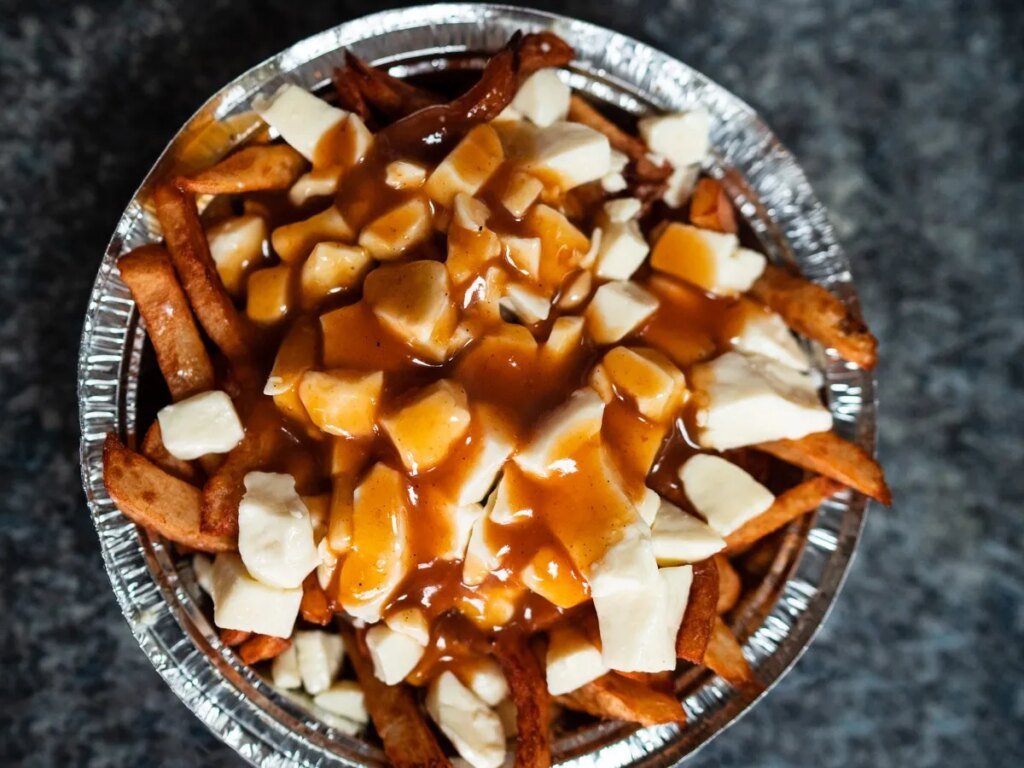Why Quebec wants to protect the cheese curds it claims are necessary to make 'original' poutine