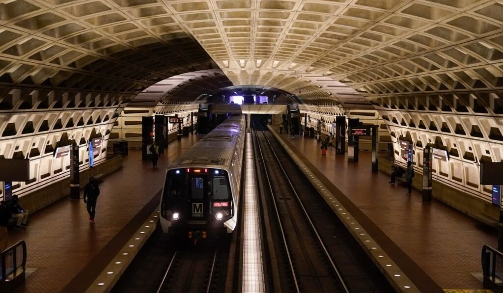 A work vehicle hits a stopped Washington Metro train, injuring 11