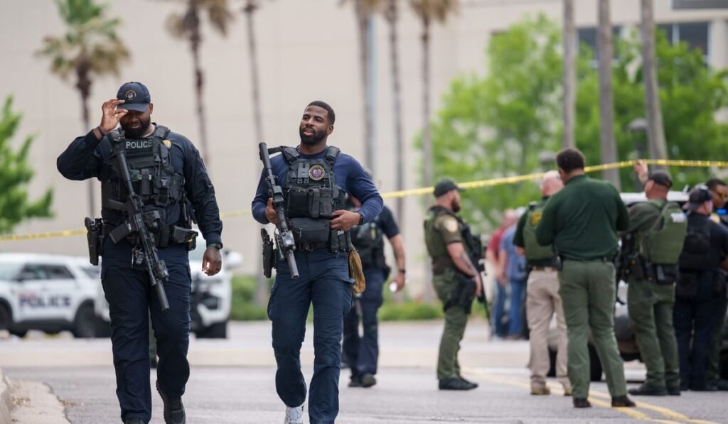 Authorities arrest one person and search for another, following deadly shooting at mall in Louisiana