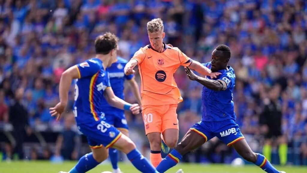 Barcelona move within sight of La Liga title after Getafe win