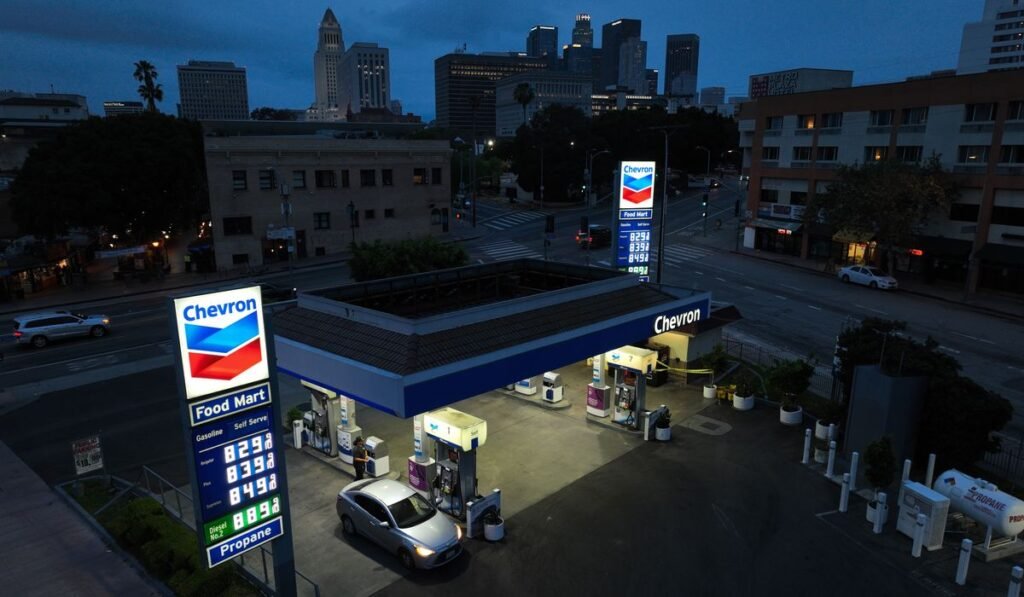 Chevron exec says that with high gas prices, Americans should drive less