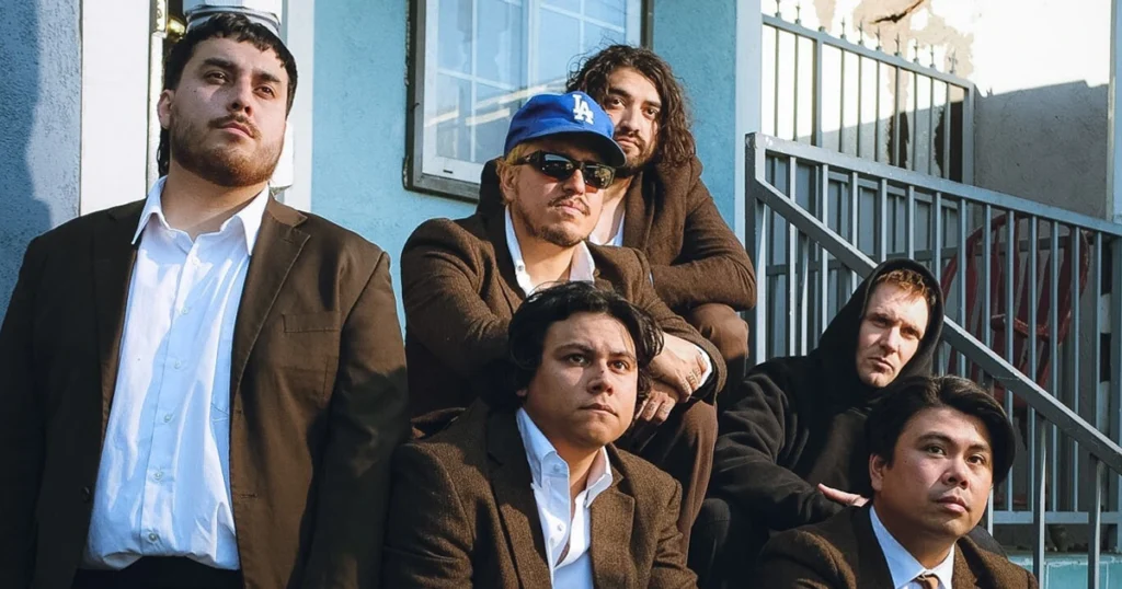 Death Lens and Militarie Gun throw a house party in “Waiting to Know” video