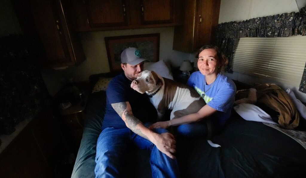 Growing wildfires blamed for death of Florida firefighter, destruction of 120 Georgia homes