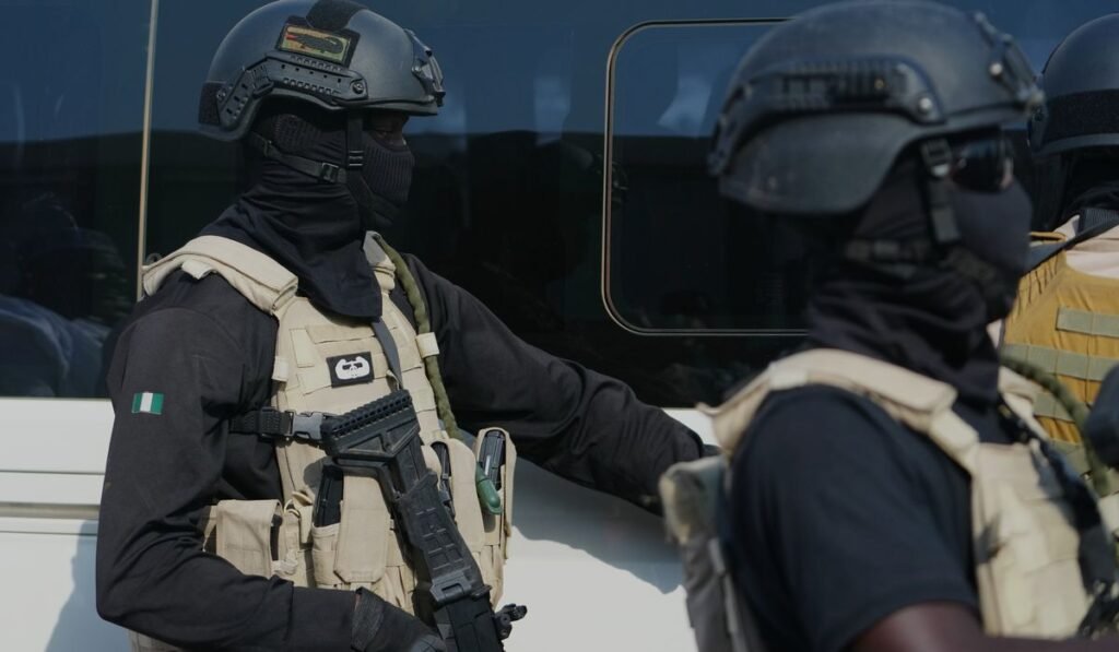 Islamic militants kill 11 people and burn homes in late night attack in Nigeria, local officials say