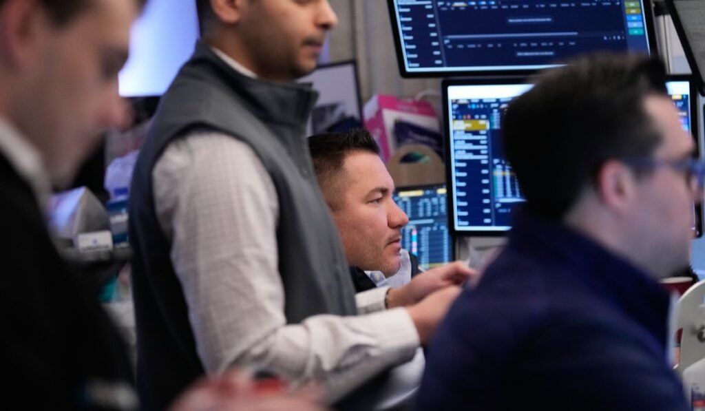 Oil prices rise, but U.S. stocks remain near their record on a muted Wall Street