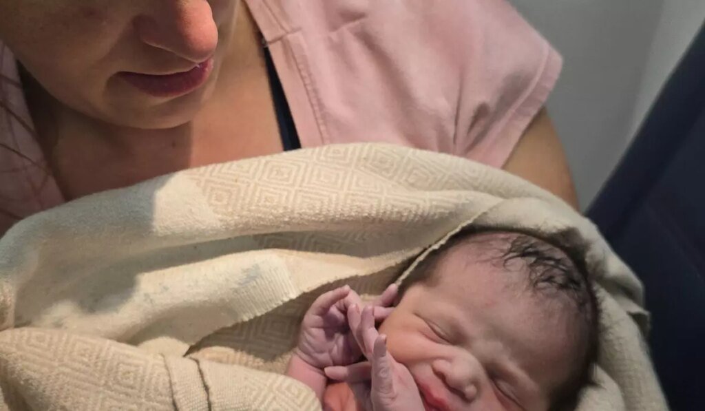 Paramedics help passenger give birth just before Delta flight lands