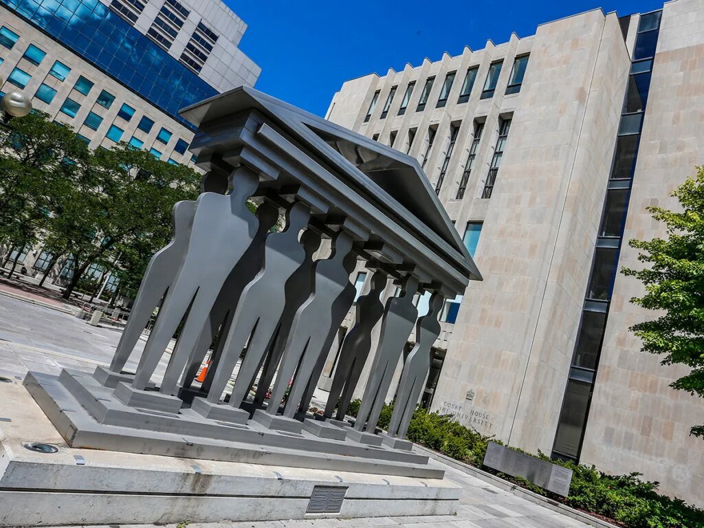 Racial discrimination factors into reduced sentence for double shooting