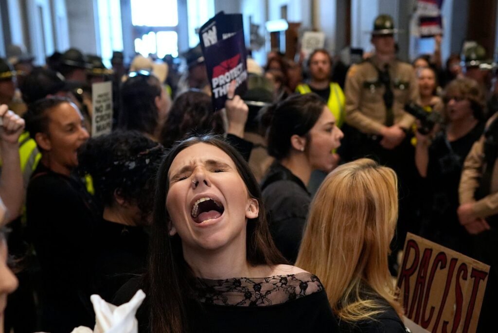 Demonstrators rally in Tennessee and Alabama against redistricting efforts, in photos