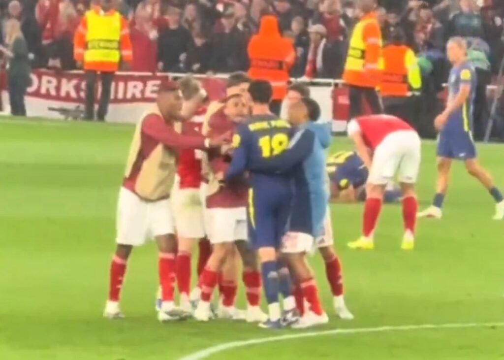 Arsenal man caught slapping Atletico Madrid player