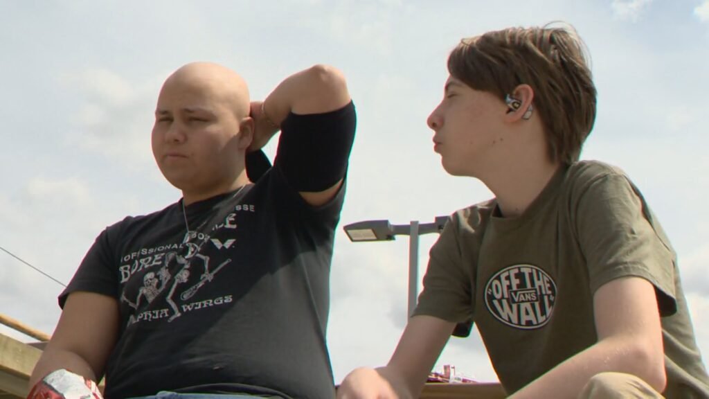 Calgary high school football community comes together to support sidelined player - Calgary