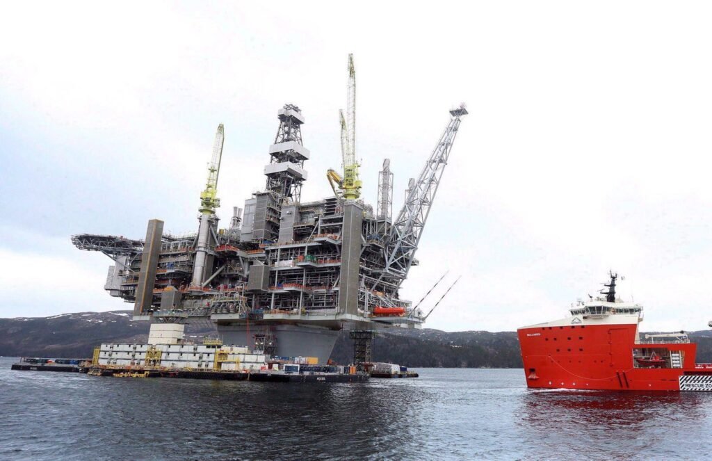 Credit agency says surging global oil prices will help N.L.'s bottom line
