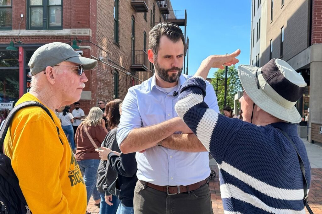 Iowa Democrats hoping to flip a US Senate seat are torn over which of 2 hopefuls has the best shot