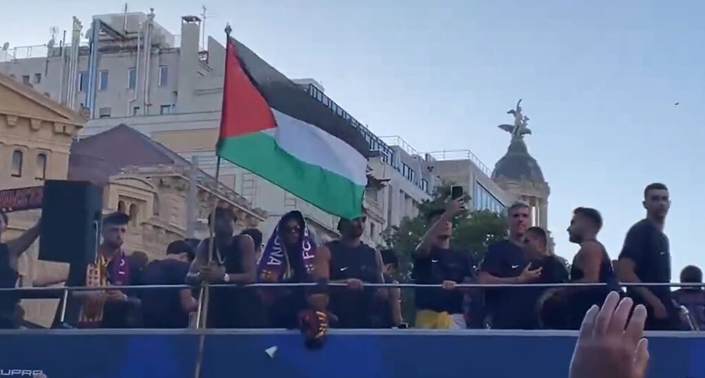 Lamine Yamal flies Palestine flag during Barcelona bus parade Lamine Yamal flies Palestine flag during Barcelona bus parade
