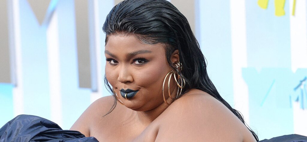 Lizzo Puts 60-Pound Weight Loss On Display In Blue Corset Outfit