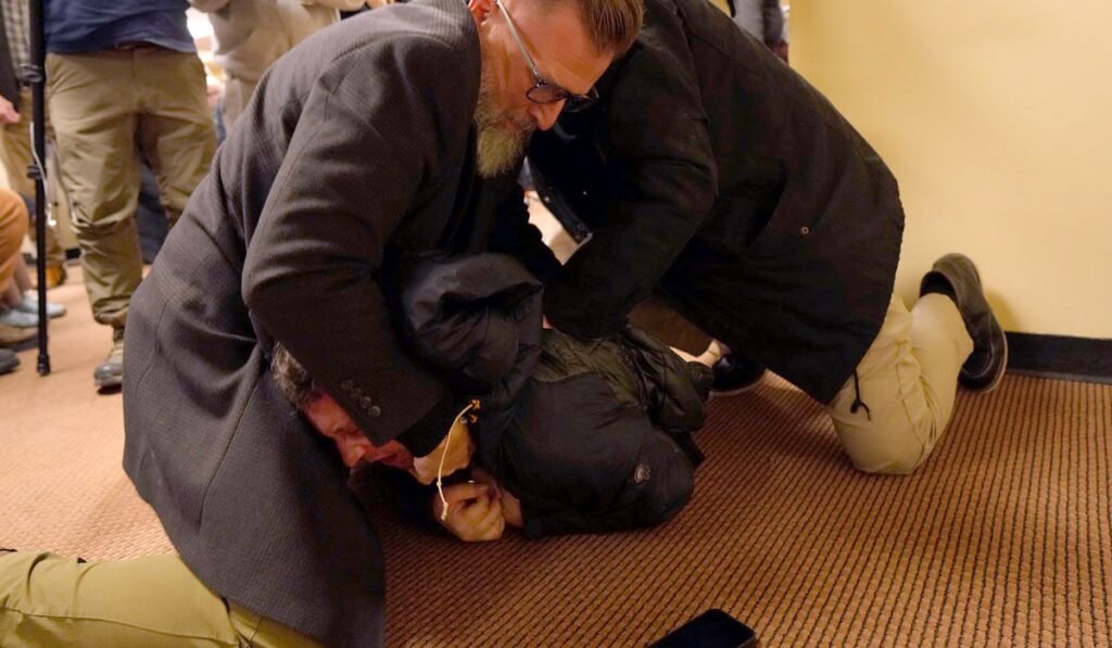 Man who sprayed vinegar at Rep. Ilhan Omar during town hall pleads guilty to assault