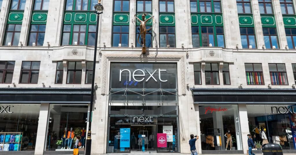 Next Lifts Outlook as Strong Sales Offset Higher Iran Costs
