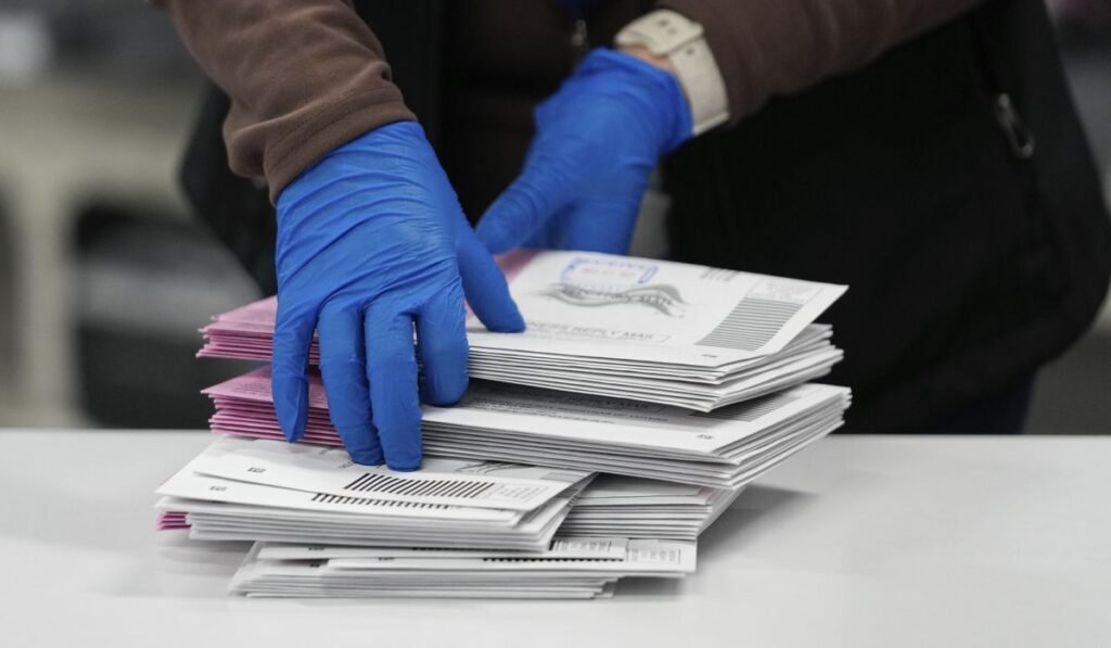 Postal service reveals plan to enforce Trump’s citizenship voting order