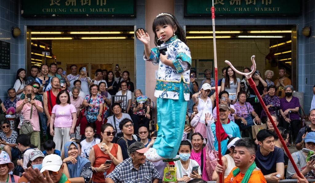 Revelers pack a Hong Kong island for a bun festival, a century-old tradition