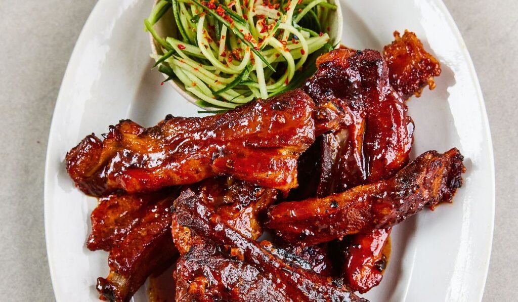 Slow-cooked, sticky-glazed pork ribs go with cucumber slaw in Sam Way’s recipe Slow-cooked, sticky-glazed pork ribs go with cucumber slaw in Sam Way’s recipe