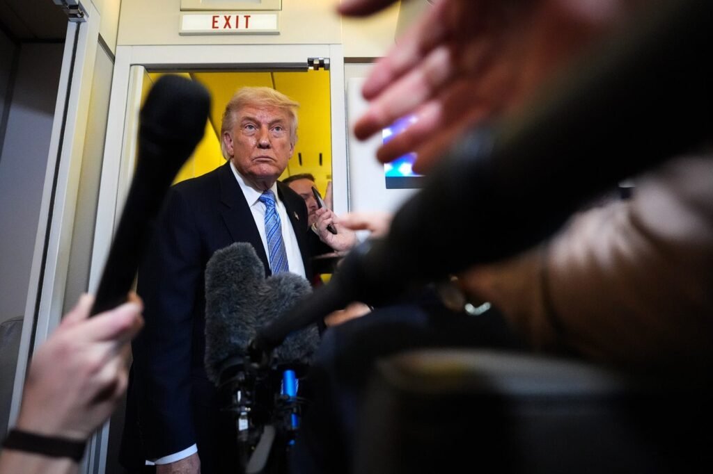 The Latest: Trump heads to a competitive New York district as voters sour on the economy