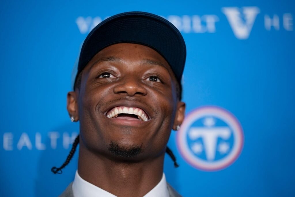 Titans first-round WR Carnell Tate signs contract Titans first-round WR Carnell Tate signs contract