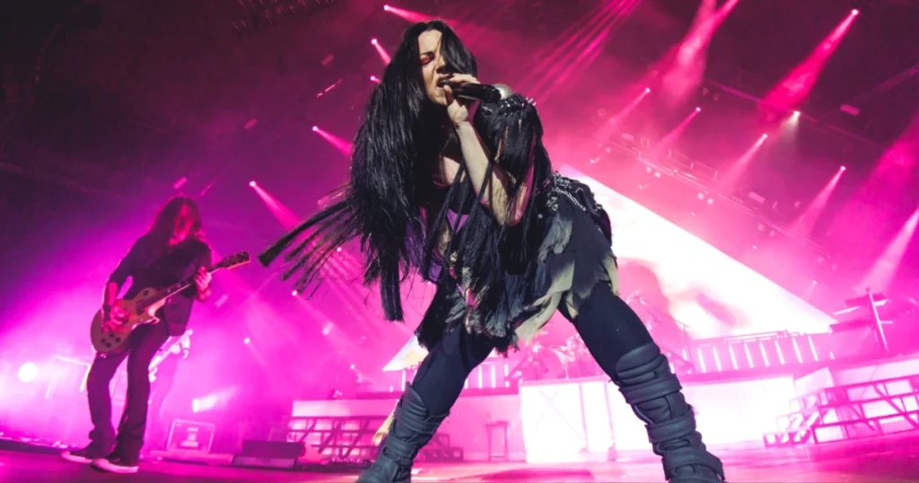 Watch Evanescence explore a collapsing world in “Who Will You Follow” video