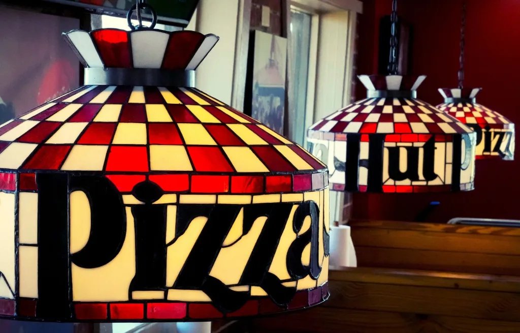 Why Pizza Hut Is Returning to Red Roofs, Red Cups and Pac-Man Why Pizza Hut Is Returning to Red Roofs, Red Cups and Pac-Man