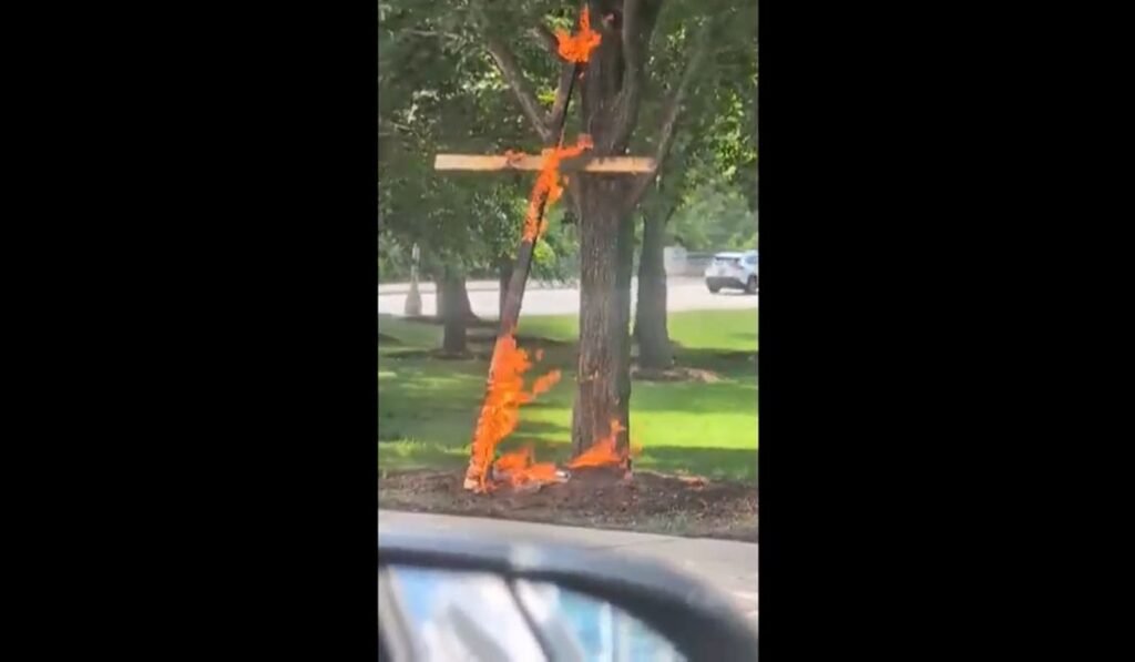 A person is in custody in a Chicago cross burning investigation, police say