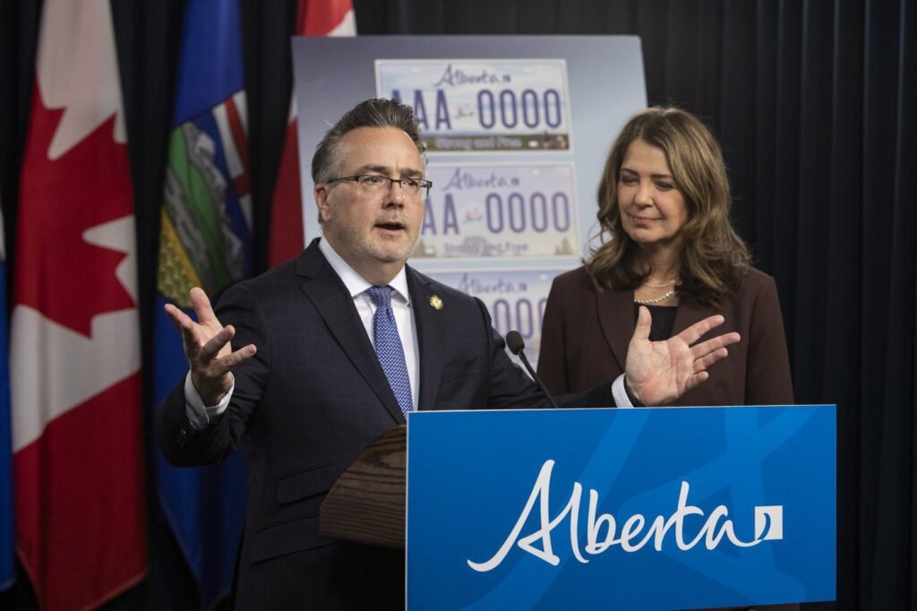 Alberta nixes booze price hike after Premier Smith, Calgary mayor snipe at each other Alberta nixes booze price hike after Premier Smith, Calgary mayor snipe at each other