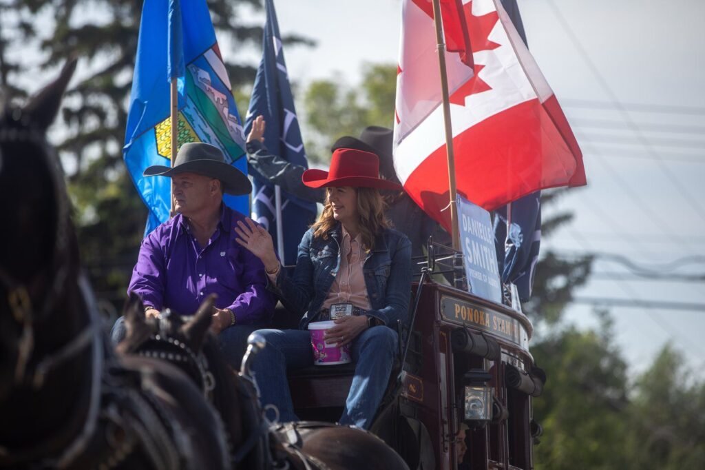 Canada, Alberta flags fly high at town parade during separatism debate