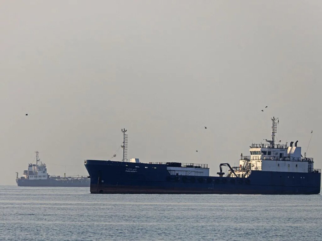 Dozens of ships sneak past Iran's Hormuz blockade with U.S. help: reports