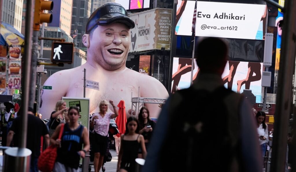 Elon Musk protest inflatable appears in Times Square ahead of SpaceX IPO