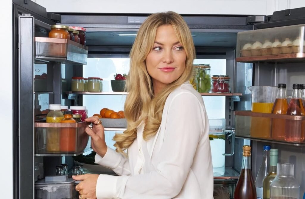 Kate Hudson’s ‘Put Me In Coach’ Caption Has Everyone Guessing Her Next Move