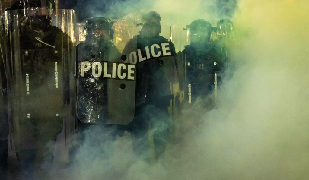 New Jersey police sergeant charged with stealing journalist’s camera bag at immigration protest