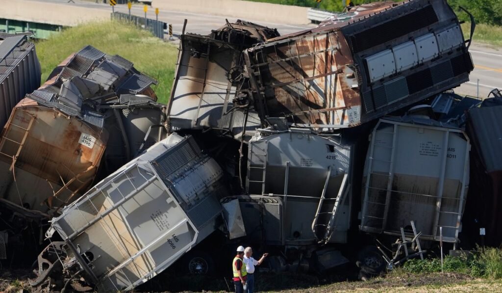 One dead and another injured after train strikes semi-truck in Iowa