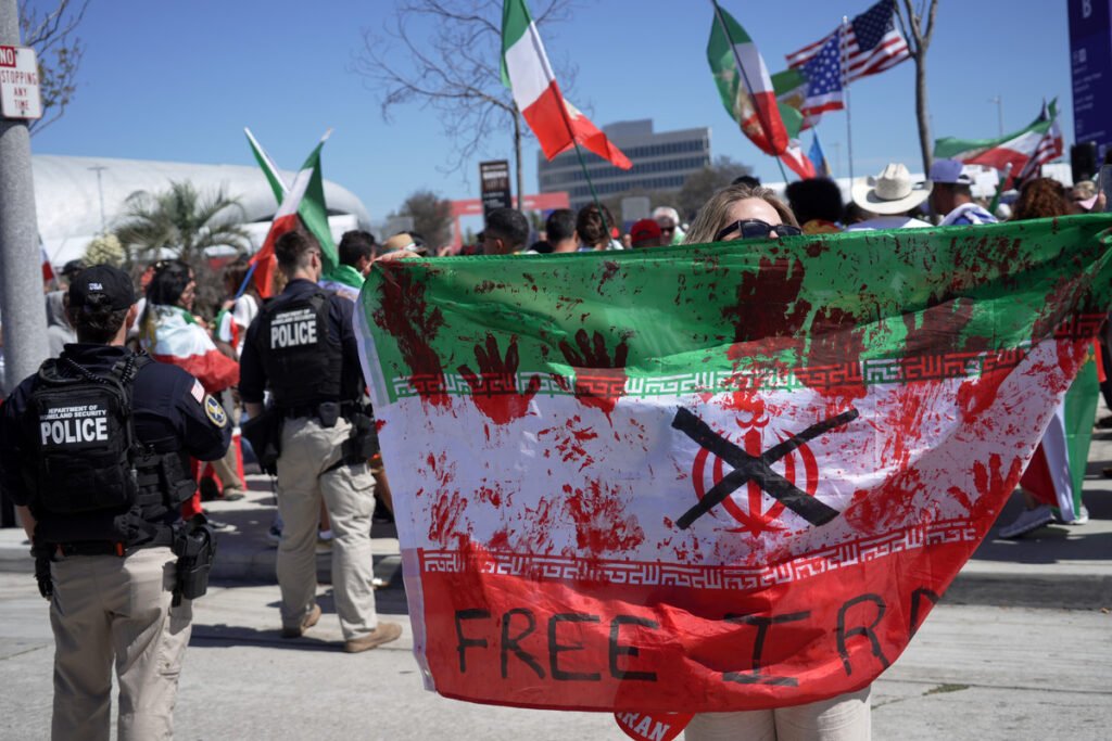 Support for Iran's team – but not for regime - Live Updates