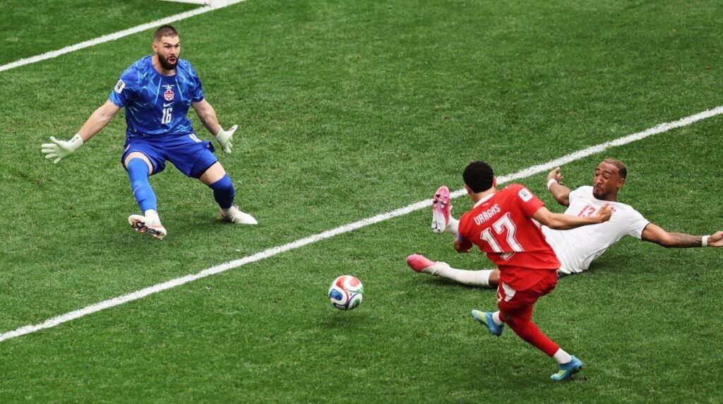 Swiss hold off fightback from co-hosts seal top spot in World Cup Group B Swiss hold off fightback from co-hosts seal top spot in World Cup Group B
