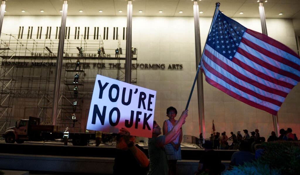 Workers begin removing Trump’s name from the Kennedy Center, hours after a court-ordered deadline