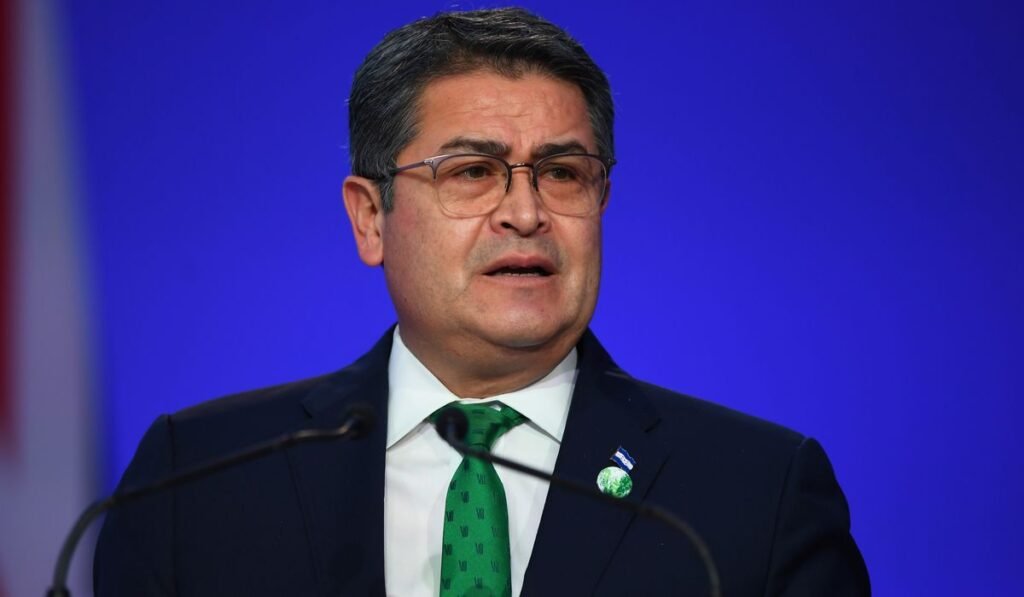 Former President Juan Orlando Hernandez returns to Honduras after arrest warrant suspended