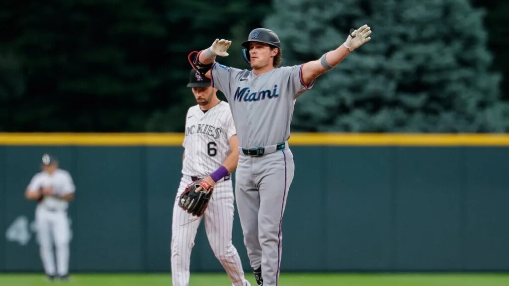Marlins rout Rockies with offensive explosion