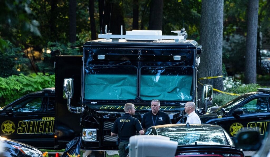 Officials say man killed wife and 6 kids, then himself, before all were found in Michigan home fire